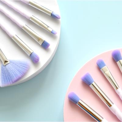 China Angular Blush Professional Makeup Brush Set Wholesale 10pcs Rainbow Color Make Up Brush Set With Spiral Handle for sale