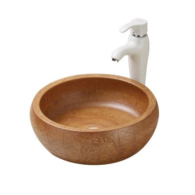 China Modern Design Marble Hand Wash Basin Round Countertop Ceramic Basin J025 for sale