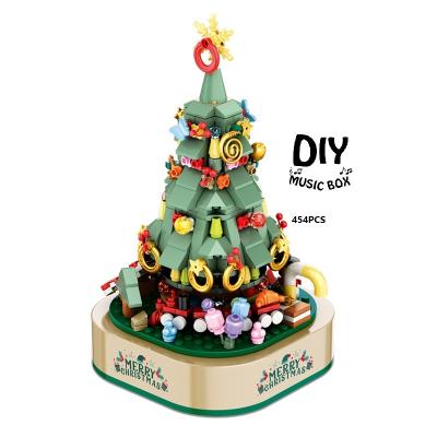 China DIY Christmas Gift DIY Christmas Gift Building Blocks Toy Plastic Xmas Tree Rotating Music Box Christmas Decoration Puzzle Bricks Gifts for sale