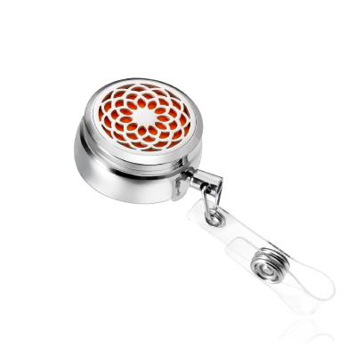 China Retractable Reel Factory Direct Retractable Stainless Steel Badge Reel Scent Diffuser Sunflower Badge Reel for sale