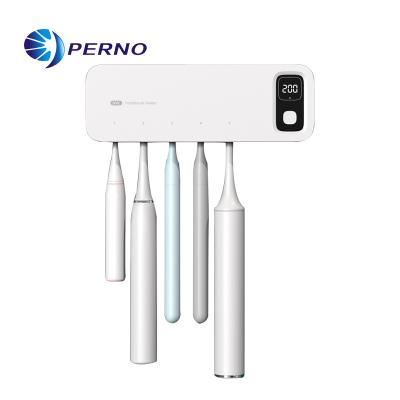 China UV Light Removes 99.9% Hands Free Dispenser Toothpaste Disinfection Toothbrush Sterilizer Bathroom Accessories Sanitizing Toothbrush Holder and Charger for sale