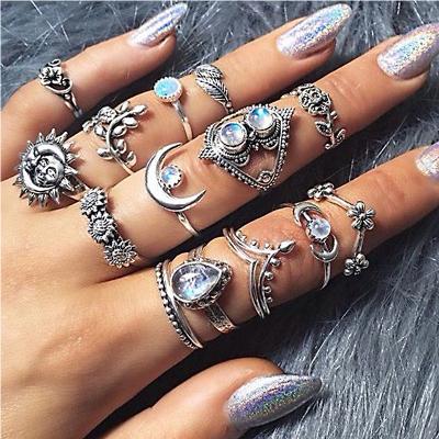 China Nickel Free Water Drop Flower Sunflower Moon Sun 14 Piece Ring Cavity Cut Diamond Ring Set for sale