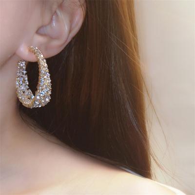 China Large 2021 retro long curved earrings of new retro metal set of diamond temperament female court earrings for sale