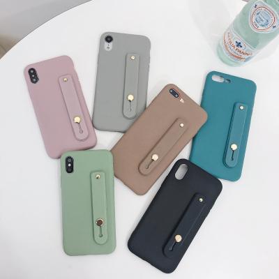 China Fashionable And Simple Push Pull Anti-fall Bracket For iPhone12 Cell Phone Leather Case With Wristband for sale