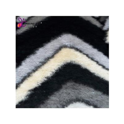 China Soft Skin-Friendly Tear-Resistant Knit Leopard Printed Faux Rabbit Fur Wholesale Fabric For Winter for sale