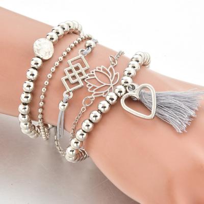 China FASHIONABLE 5pcs Ribbon Beads Retro Hollow Love Tassel Lotus Bead Stacking Bracelet Set for sale