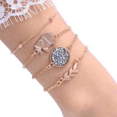 China FASHIONABLE Pearl Chain Metal Diamond Jewelry Alloy Leaf Elephant Female Bracelet Set For Women for sale