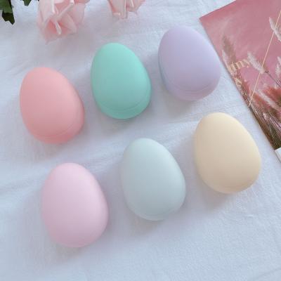 China Compact Cute Egg Shape Green and Pink Soft Nylon Pins Hair Brush Travel Size Small Kids Hair Brush for Wet or Dry Hair for sale