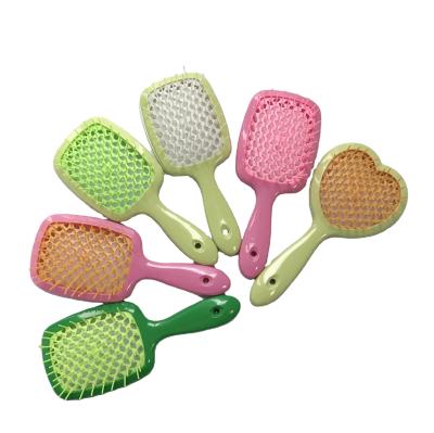 China Detangle Compact Hair Brush Ergonmicly Adapting Material Flexible Design Wet And Dry Hair Brush for sale