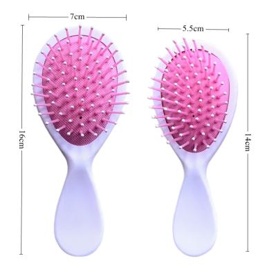 China Compact plastic wholesale hair comb brush detangling pink detangle brush for hair for sale