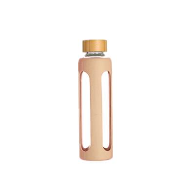 China Drinking/Promotion/Gift Purpose Lid 550ML Borosilicate Glass Water Bottle Bamboo Drinking Bottle for sale