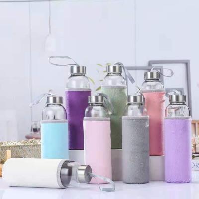 China Colorful Freshness Retention 500ml Water Sport Glass Bottle With Sleeve And Cloth Cover For Juice for sale