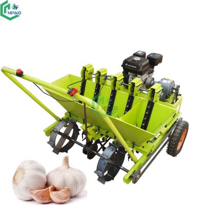 China Automatic Agricultural Manual Agriculture Garlic Seeder Farming Garlic Planter Hand Held Garlic Sowing Machine for sale