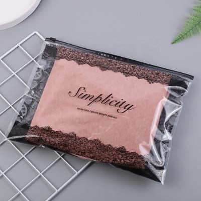 China Recyclable Transparent PE Clothing Zipper Plastic Bag Bra Packaging Pajamas Lace Up Printing Packaging Bag Logo Custom for sale