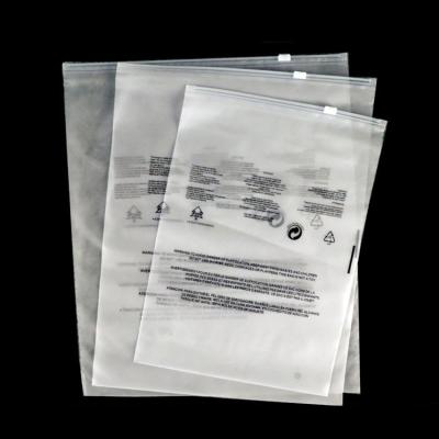 China Recyclable PE Frosted Zipper Bag Clothes Plastic Packaging Bag With Warning Zipper Bag Custom Logo for sale