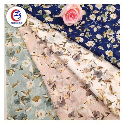 China New design anti-static luxury silk african low price floral printed heavy chiffon polyester fabric for sale