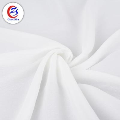 China Breathability Comfortability Design Solid Color Peach Polyester Voile Woven Plain White 100% Chiffon Fabric for sale