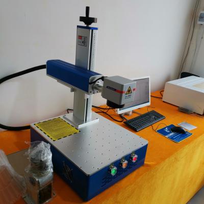 China Laser Engraving Mini Portable Laser Marker 20W 30W 50W Fiber Laser Marking Machine Qr Code Laser Engraving Machine for sale