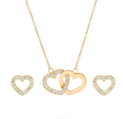 China Wholesale TRENDY Stainless Steel Women Set Jewelry Gold Heart Shaped Design Two Piece Earring And Necklace Set for sale