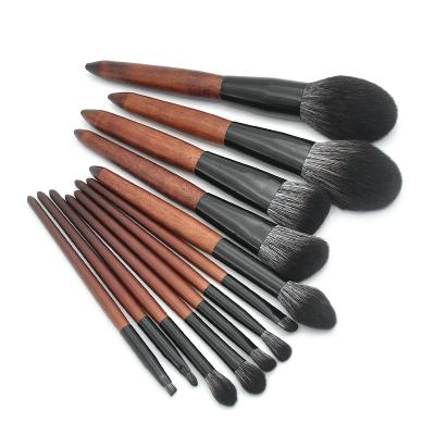 China Angular Blush New Ebony Wood 12 Color Black And White Fiber Hair Wooden Handle Makeup Brush Beauty Makeup Brush Set Custom LOGO for sale