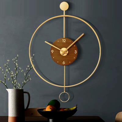 China Creative Personalized BREF Wall Watch Light Living Room Watch American European Style Modern Home Nordic Spanish Luxury Wall Clock for sale