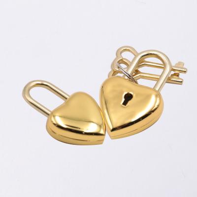 China Luggage Wholesale High Quality Colorful Love Heart Shaped Lock,Padlock With Key For Strap Lock In Locks for sale