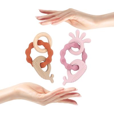 China 2022 New Product Sweet Ideas Toys , Baby Teether Toy Teething Sensory Whale Train Teether Food Grade Silicone Wooden Baby Teethers for sale