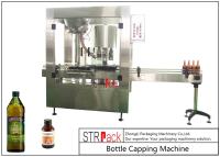 China Rotary 4 Head Aluminium Bottle Cap Machine For Syrup / Olive Oil Screw Thread Cap for sale