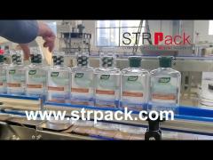 Automatic Hair Oil Bottle Filling Capping Labeling Machines-STRPACK Liquid Filling Solutions