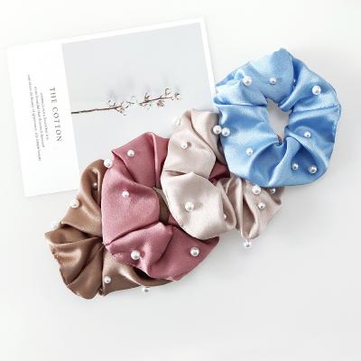 China 2021 European and American style hot selling girls hair accessories bead ponytail holder satin scrunchies for women for sale