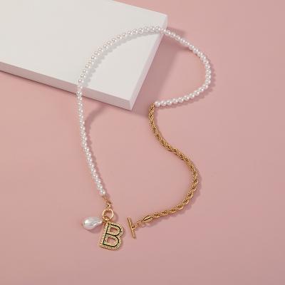 China Neo-Gothic Asymmetrical Soft Clavicle Chain Letter B Necklace Metal Twist Metal Bead Half Bead Necklace for sale