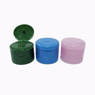 China Non Spill Colorful Plastic Lids Flip Top Cap For Cosmetic Packaging for sale