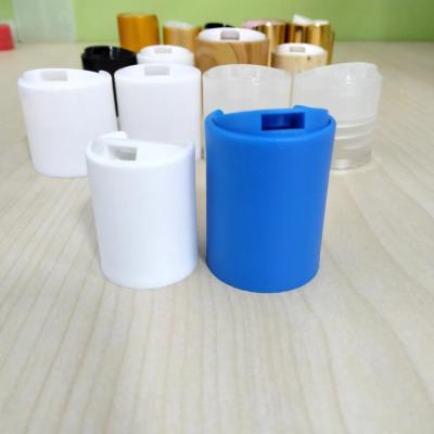 China Non Spill 24/410 28/410 White Black Disc Top Cap Matte Wall With Vented Seal For Shampoo Bottle for sale