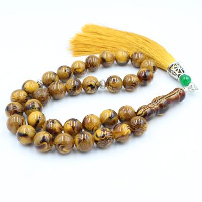 China The Amber Islamic Rosary 12mm 33 Yellow Tassel Prayer Beads Bracelet Muslim Arabic Turkish Resin Rosary Bead Bracelets for sale