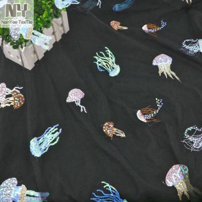 China Nanyee Breathable Textile Sea Jellyfish Sequin Animal Blue Black Mesh Fabric for sale