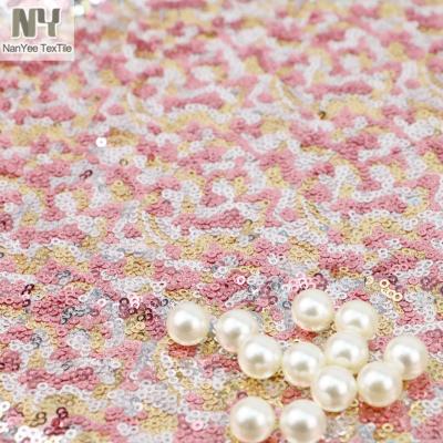 China Nanyee Breathable Textile Rose Gold Silver Elastic Sequin Mesh Fabric for sale