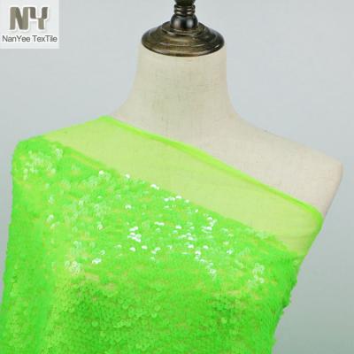 China Nanyee Textile Wholesale 6mm Fluorescent Light Green Neon Color Sequin Fabric for sale