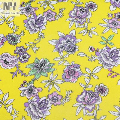 China Custom Designs Nanyee Textile Sublimation Printed Knit Yellow Floral Jacquard Fabric for sale