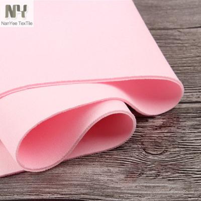 China Nanyee Textile Polyester Fluorescent Solid Dyed Knitted Scuba Textile Fabric for sale