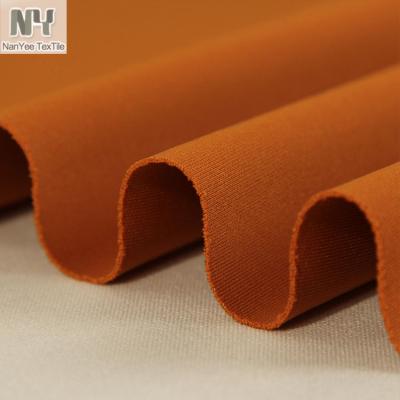 China Nanyee Fluorescent Textile Dark Tan Color Polyester Air Layer Spandex Fabric for sale