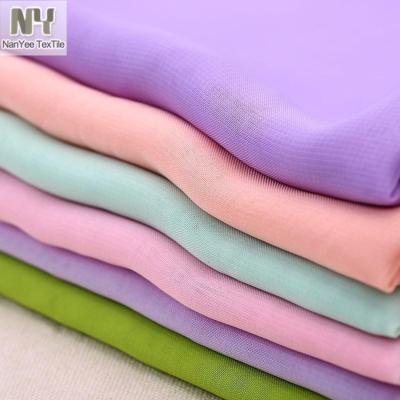 China Nanyee Textile Fluorescent Stock Dyed Colored Polyester Chiffon Chiffon Fabric Wholesale Rolls for sale