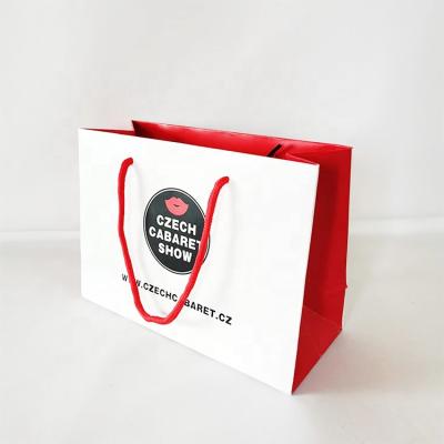 China Handmade Luxury Custom Portable Ribbon Handle Gift Shopping Paper Bags With Logo for sale