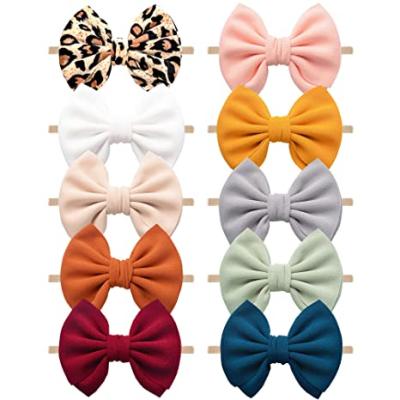 China Sweet Pack of 10 Stretchy Handmade Nylon Hair Bows Babies Hairbands Headbands for Newborn Toddler Infant Kids for sale