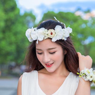 China Eralove Fashionable Wedding Bridesmaid Headband Summer Seaside Hair Accessories Floral Photo Props Flower Crown for sale