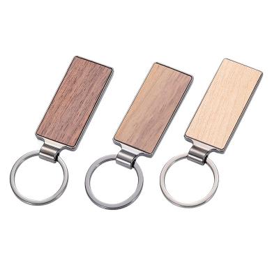 China Custom Wooden Key Chain Laser Logo Engraving Wood Keychain Wholesale Fashional Souvenir Gifts for sale