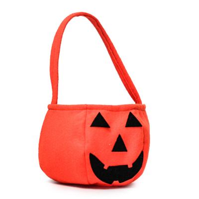 China Promotional Plush or Nonwoven Fabric 2022 Nonwoven Fabric Pumpkin Designed Halloween Candy Bucket for sale