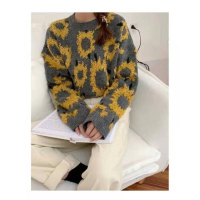 China Latest Long Loose Jacquard Thick Warm Jacquard Anti-Shrink Knit O-Neck Sweater for sale