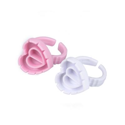 China Worldbeauty Hot Popular Plastic Eyelash Extension Tools One Second Heart Shape Glue Cup Blooming Colorful Ring for sale