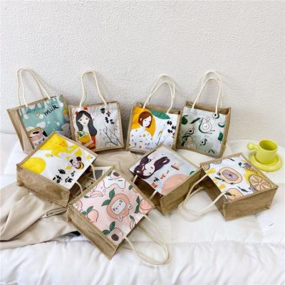 China Cute Fashion Cheap Custom Handbags Rope Small Student Cartoon Shopping Women Jute Tote Bag for sale