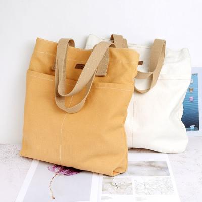 China Japanese High Quality Natural Cotton Handled Washed Canvas Tote Bag Men Women Shoulder Luxury Shopping Bag for sale